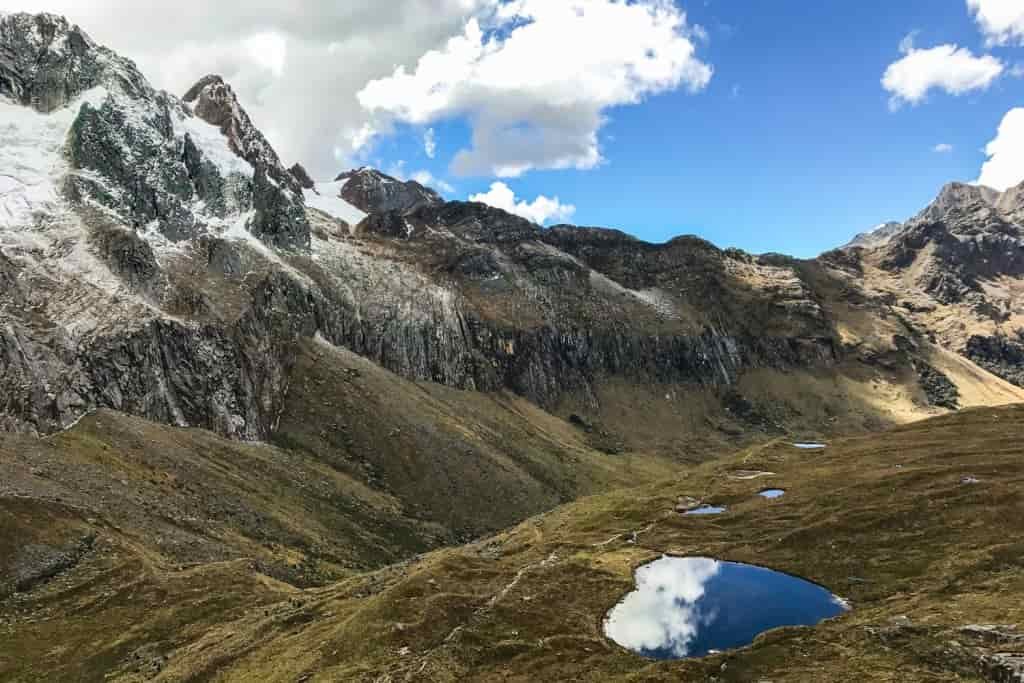 Landscape shot of high mountain scenery with a heart-shaped lake