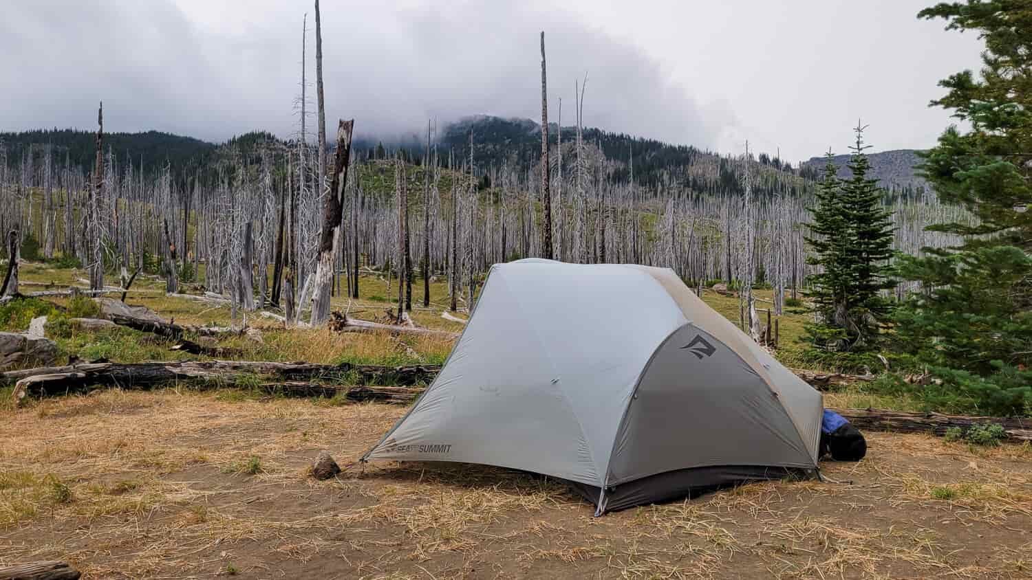 The Telos backpacking tent riding out a storm with the rainfly repelling water.
