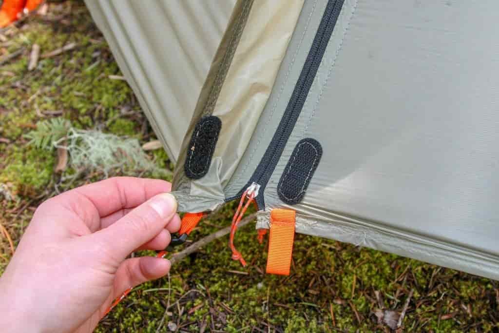 close up of the closure of a rain fly on a tent