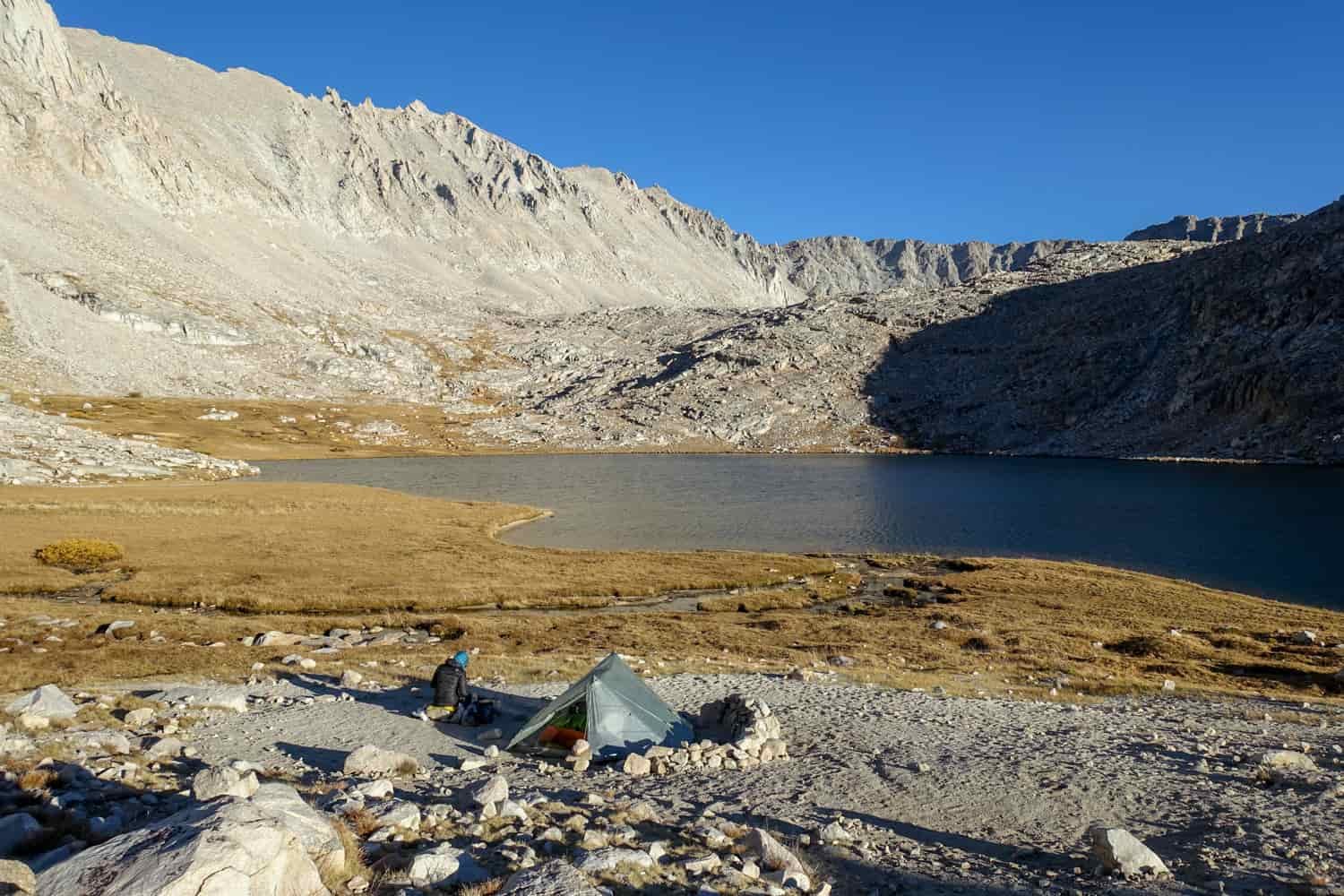 camping near a lake in a high sierra basin on the John Muir Trail.
