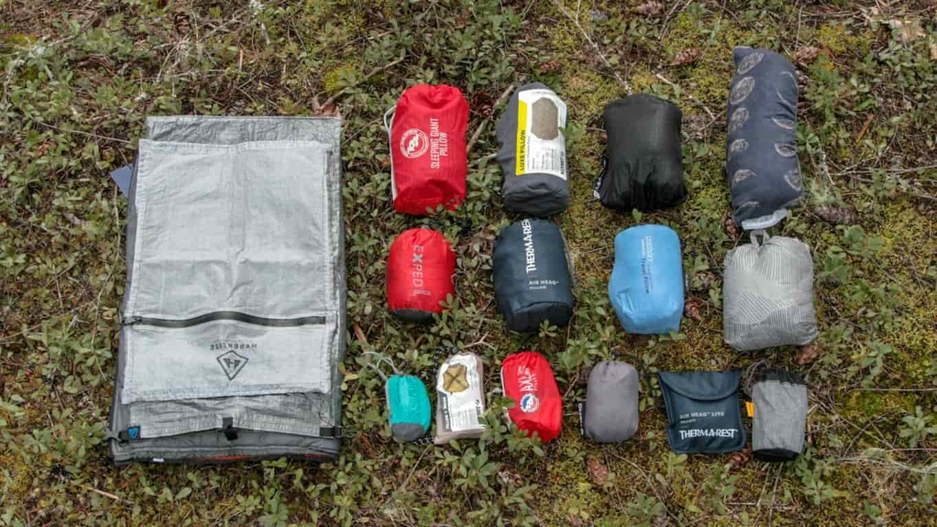 A-group-of-pillows-packed-into-their-bags-for-size-comparison