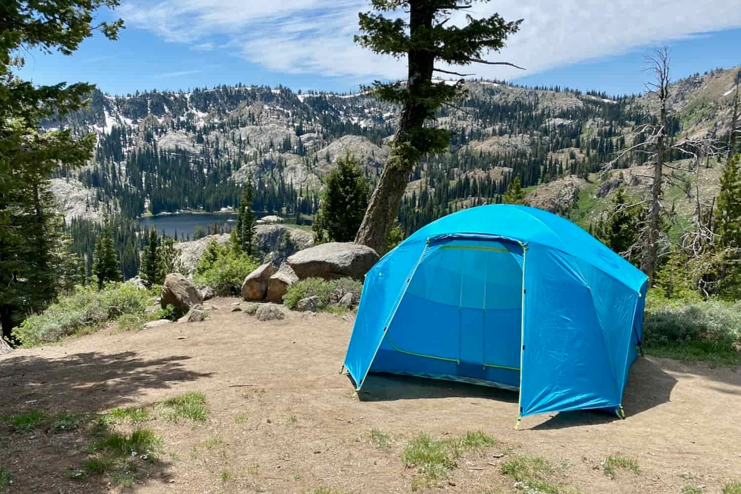 The NEMO Aurora Highrise Tent in a campsite above a lake
