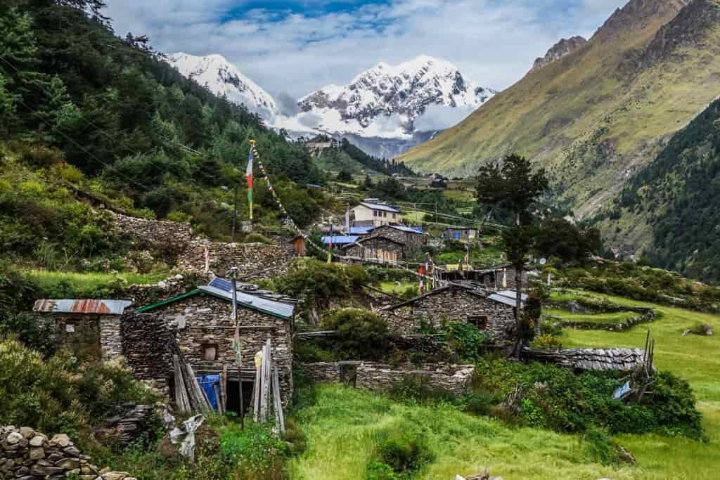 A village in the valley with homes made of stone blocks 