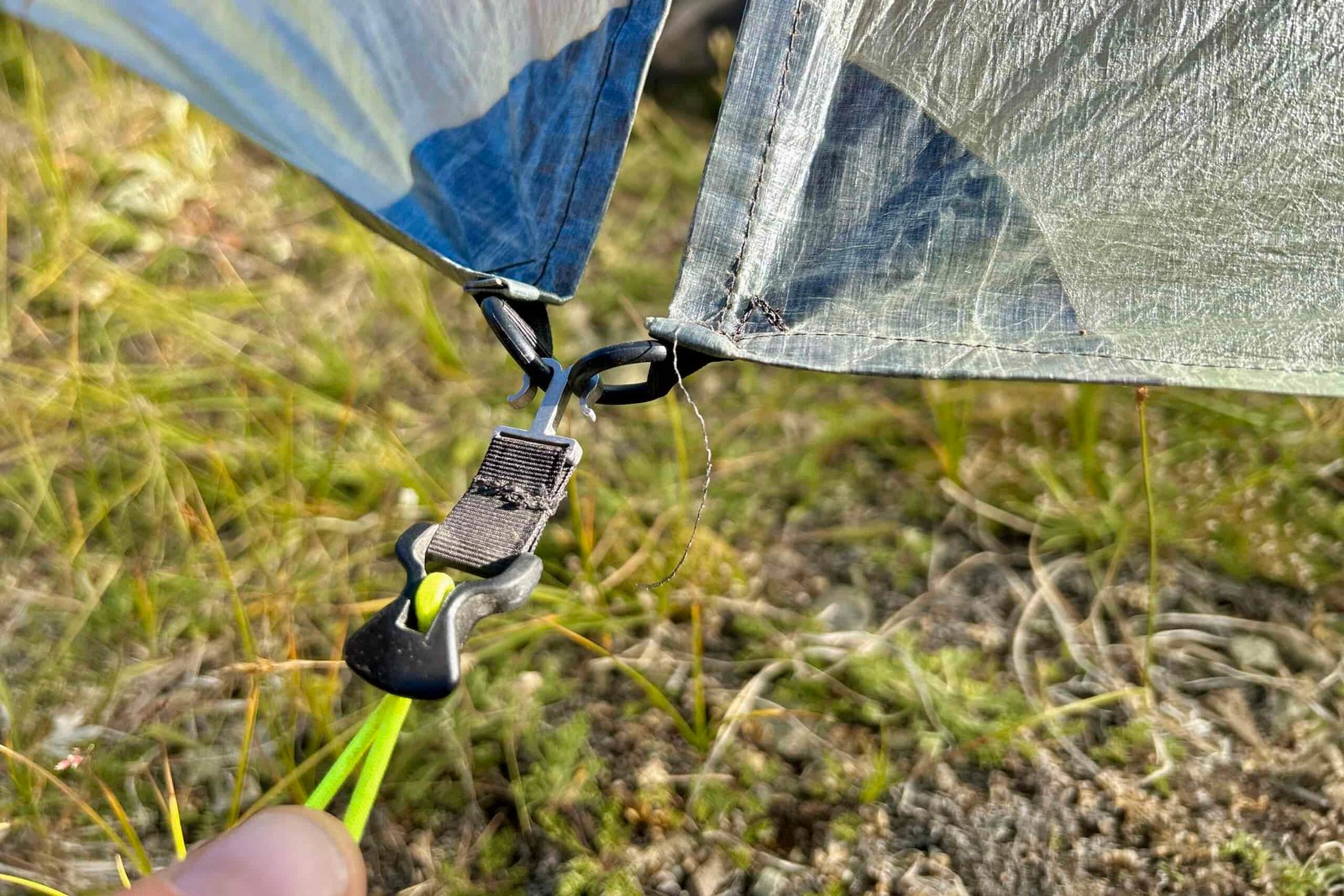a close up of the guylines, hooks and loops on the rainfly/vestibule/door part of the zpacks duplex classic tent