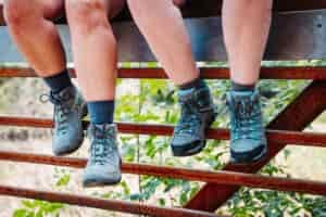 Two hikers wearing the Keen Targhee IV WP and Merrell Moab 3 WP Women's Hiking Boots