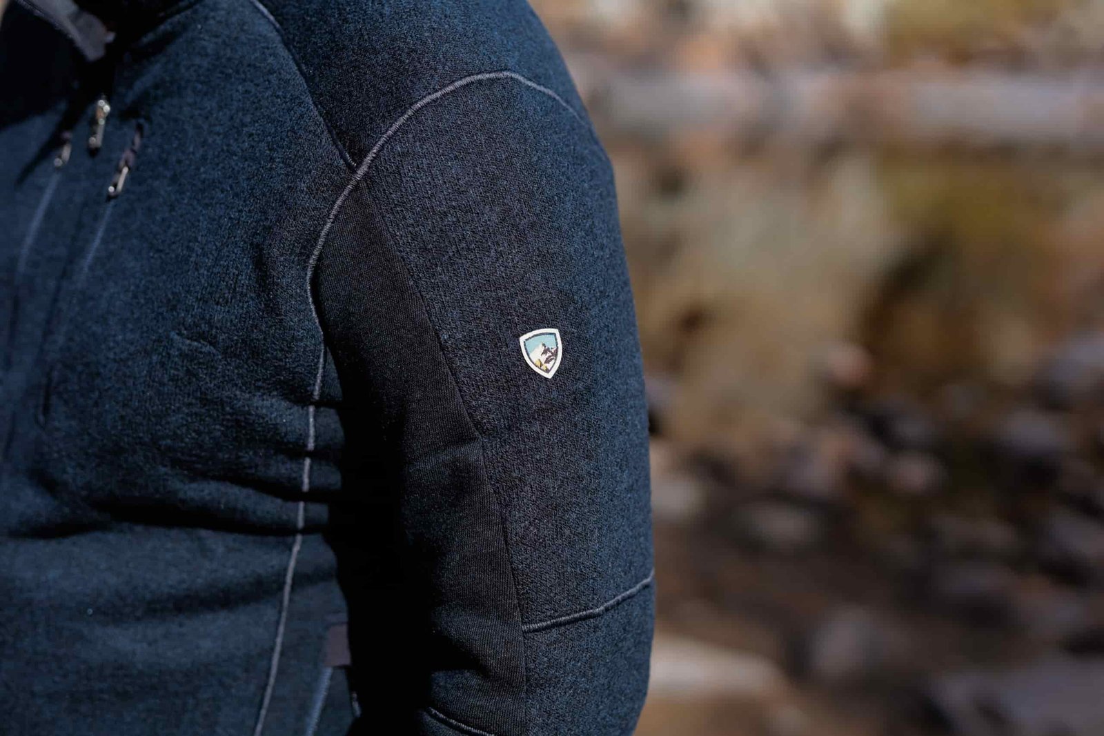 The KUHL logo on a sleeve.