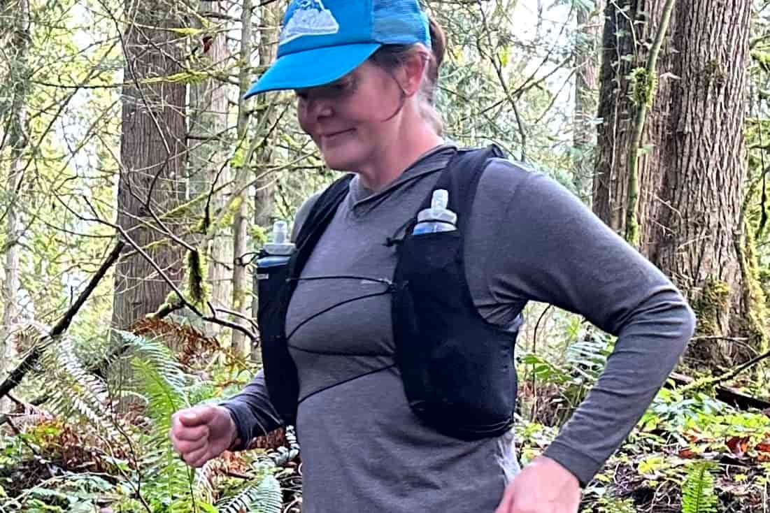 Runner wearing a Salomon ADV Skin 12 Unisex Running Vest
