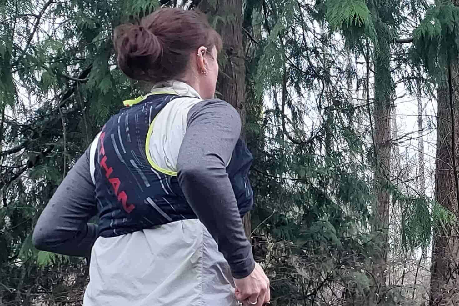 Runner wearing the Nathan Pinnacle 4 Hydration Race Vest
