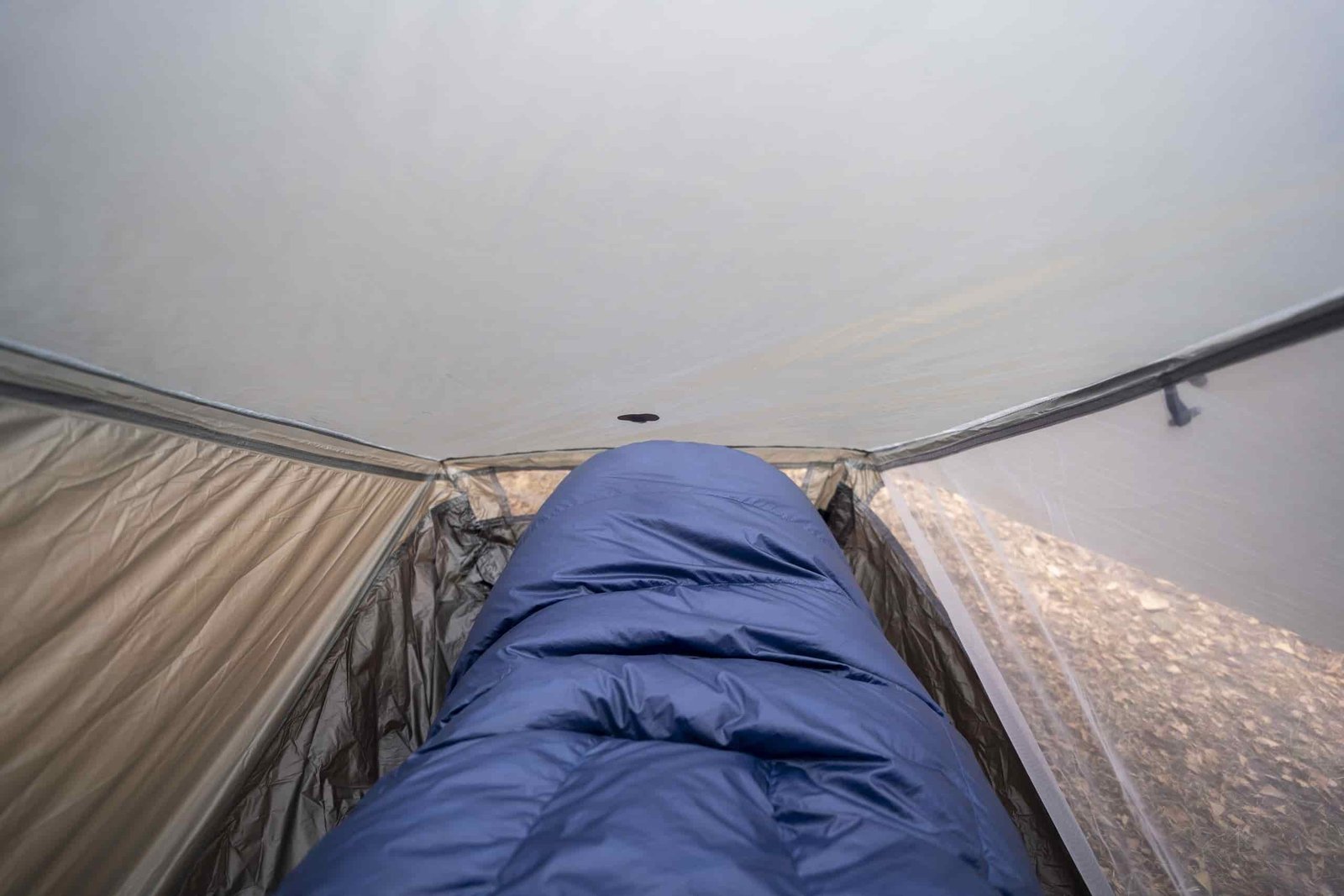 a sleeping bag inside a one person tent