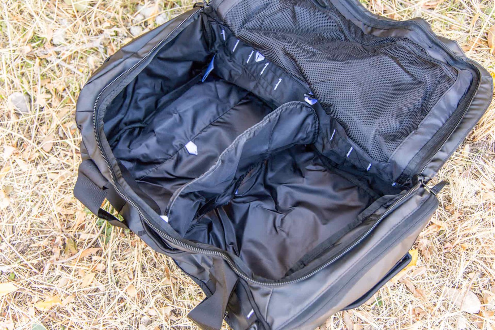 The inside of the duffel showing the interior divider positioned in the middle.