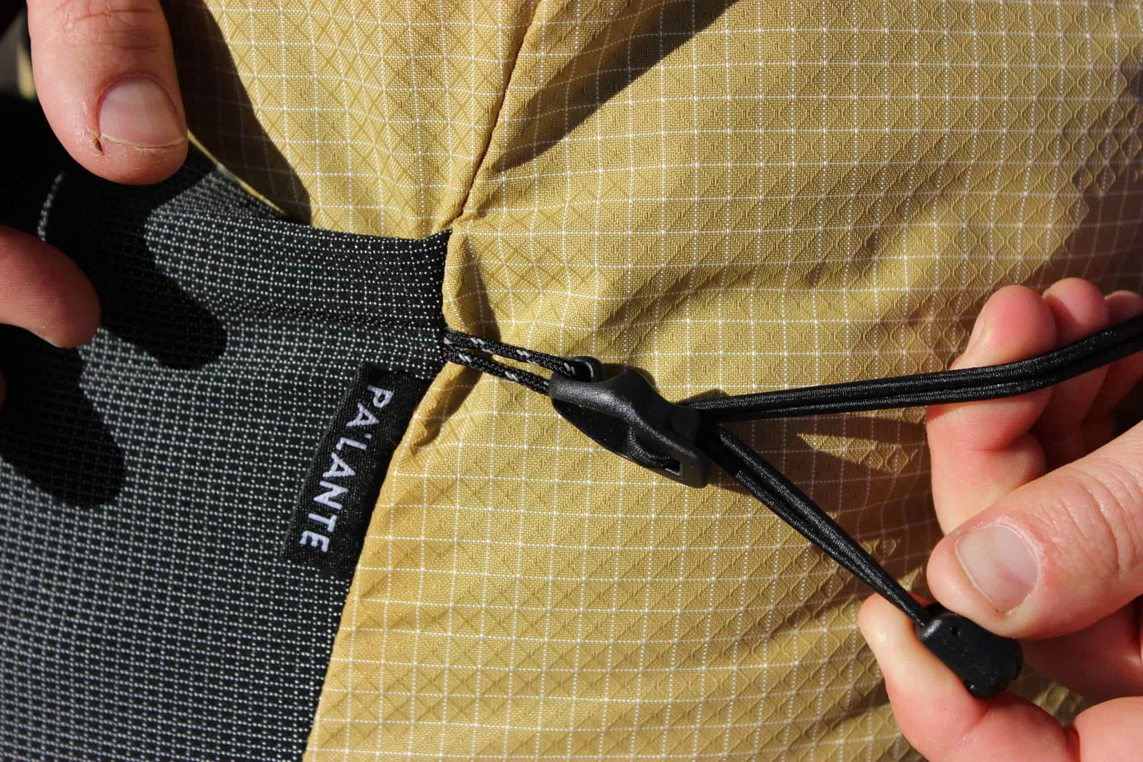 A close up of the side straps on the Pa'Lante V2.