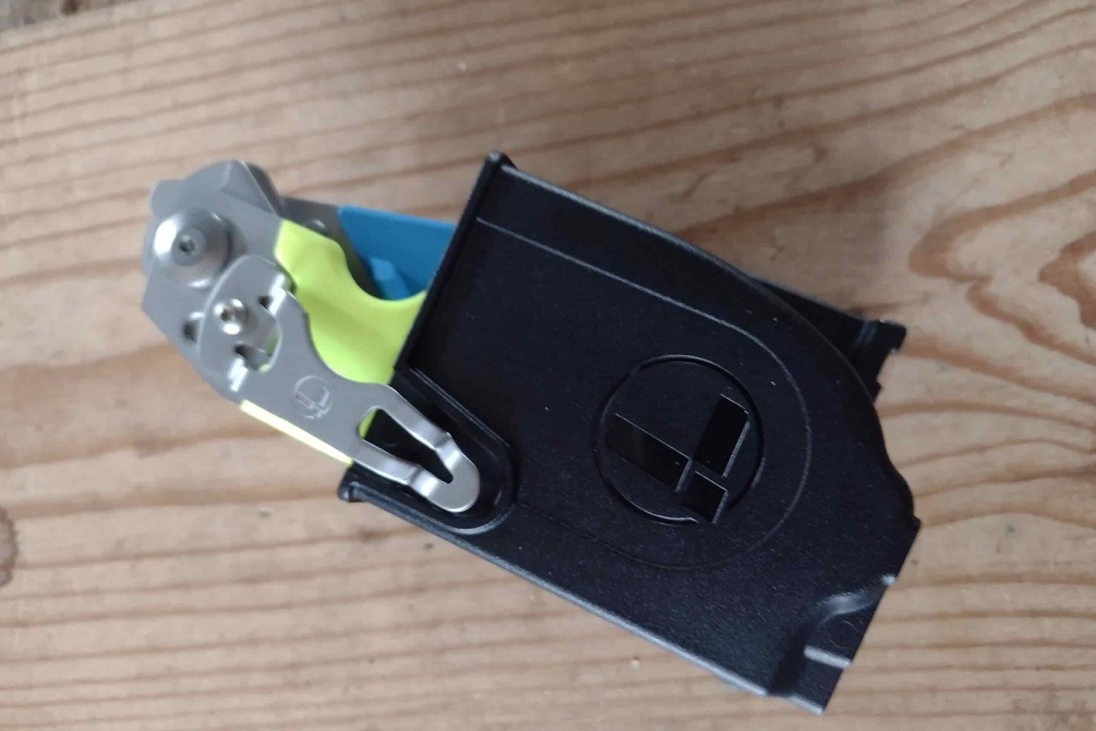 The Leatherman Raptor in its black holster.