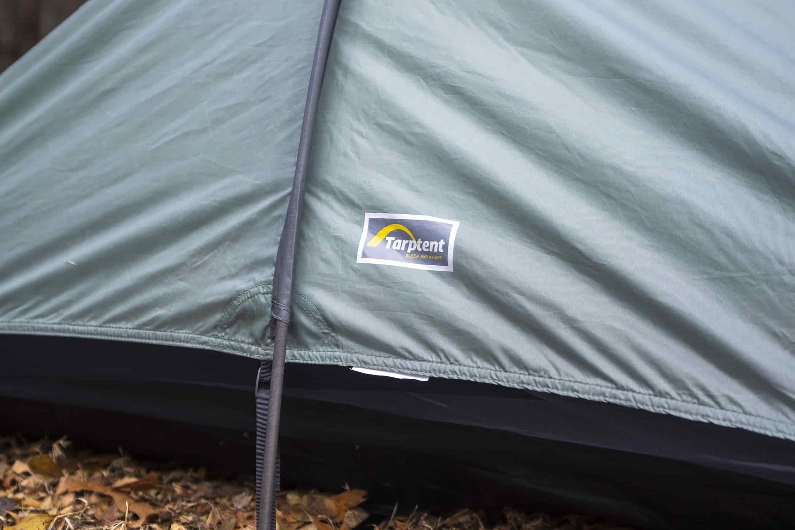 A company logo on a tent end