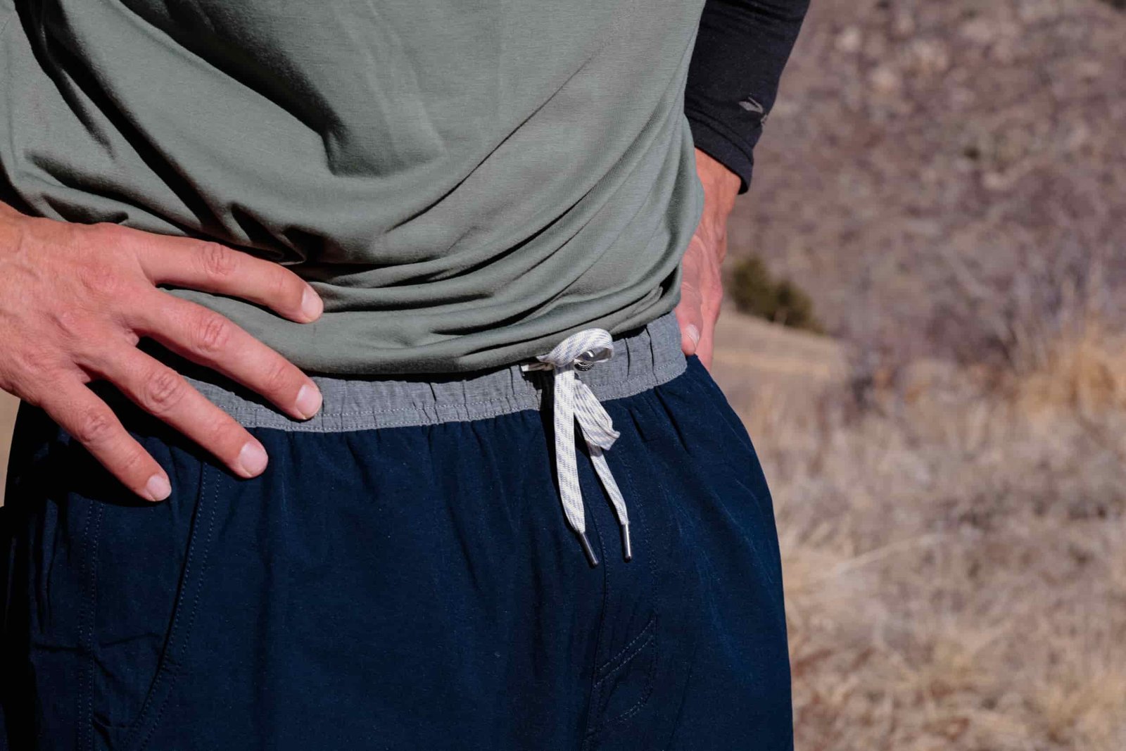 Close up of drawstring on shorts.