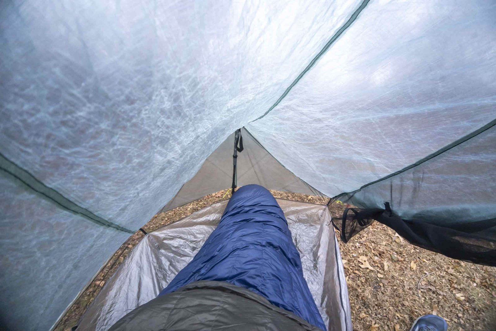 a sleeping bag inside a one person tent