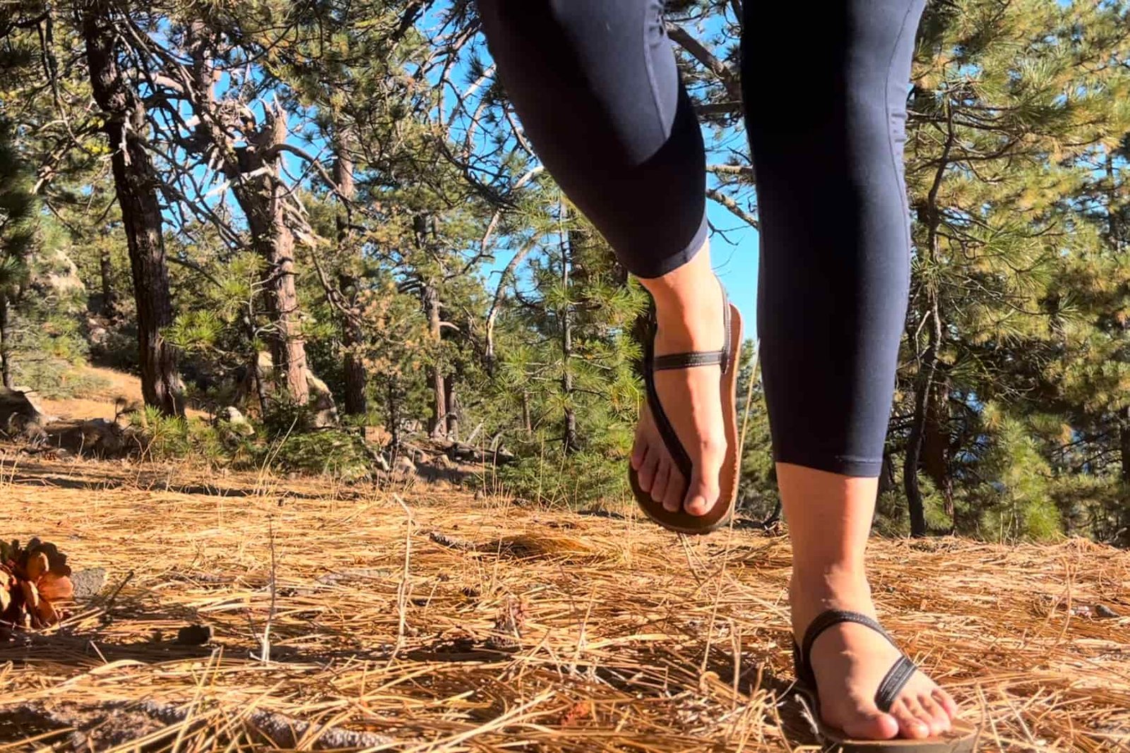 Our tester wearing the Earth Runner Alpha sandals on a hike.