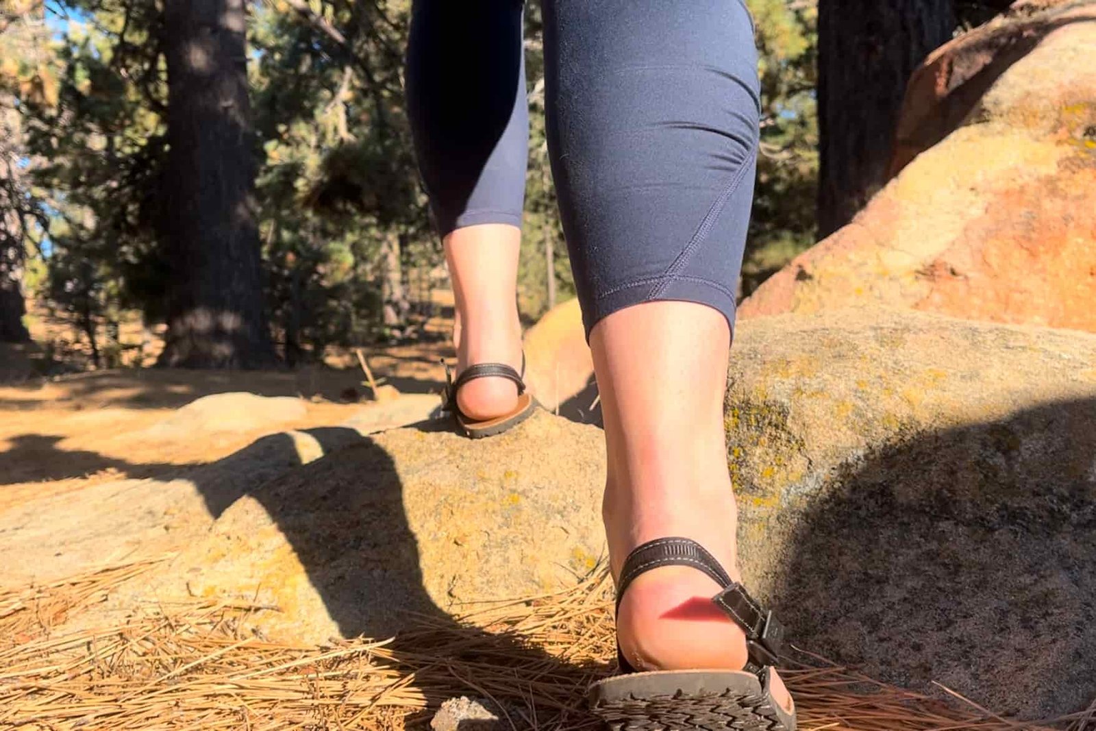 Our tester wearing the Earth Runner Alpha sandals on a hike.
