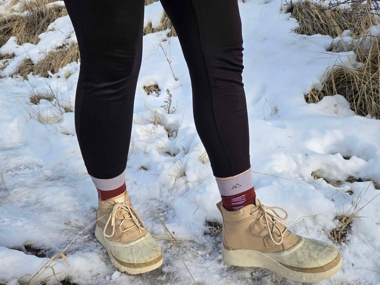 woman walking on snow in sorel out-n-about IV's