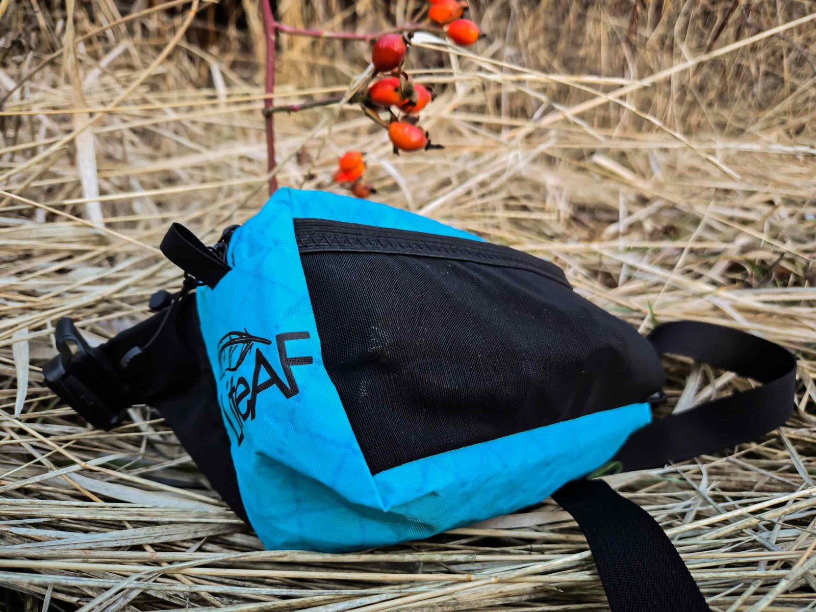 the liteaf featherweight fanny pack resting on the ground