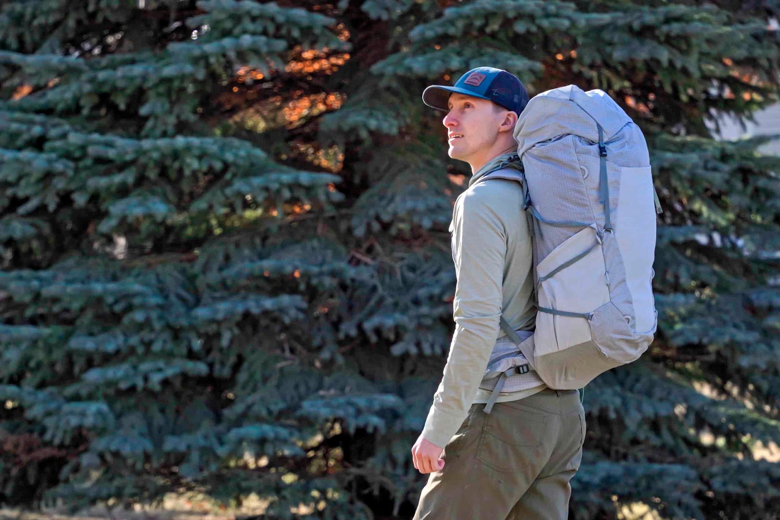 a man wearing a white backpack
