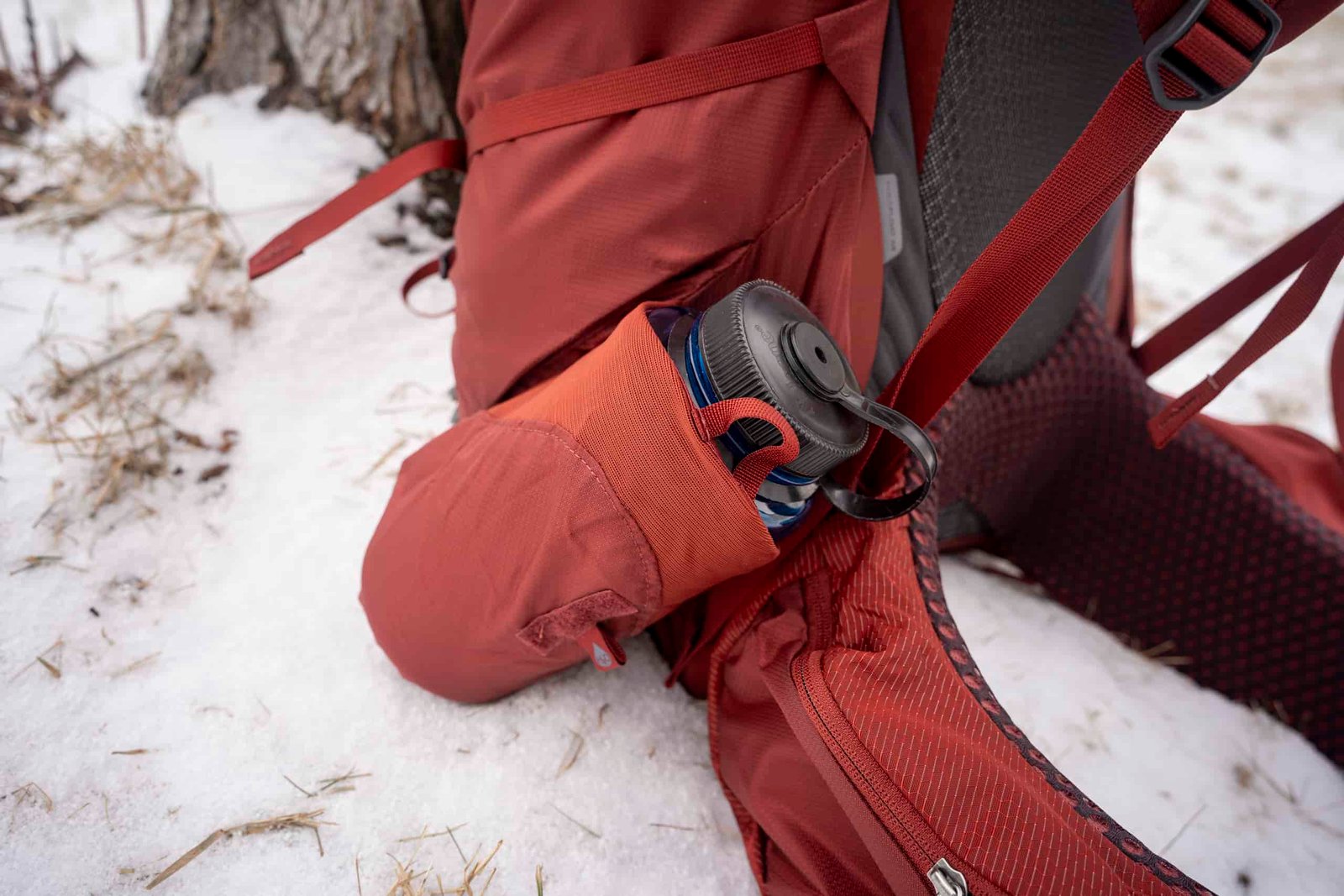 water bottle in side pocket of backpack