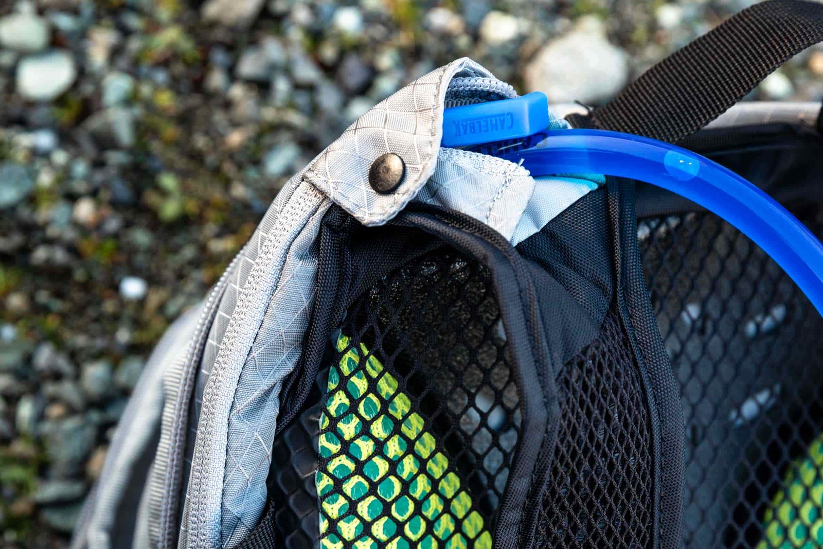 Details of CamelBak H.A.W.G. Pro 20 100oz - close up view of the hydration hose coming off the shoulder of the pack