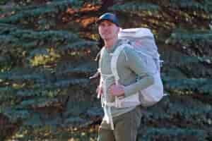 a man wearing a white backpack
