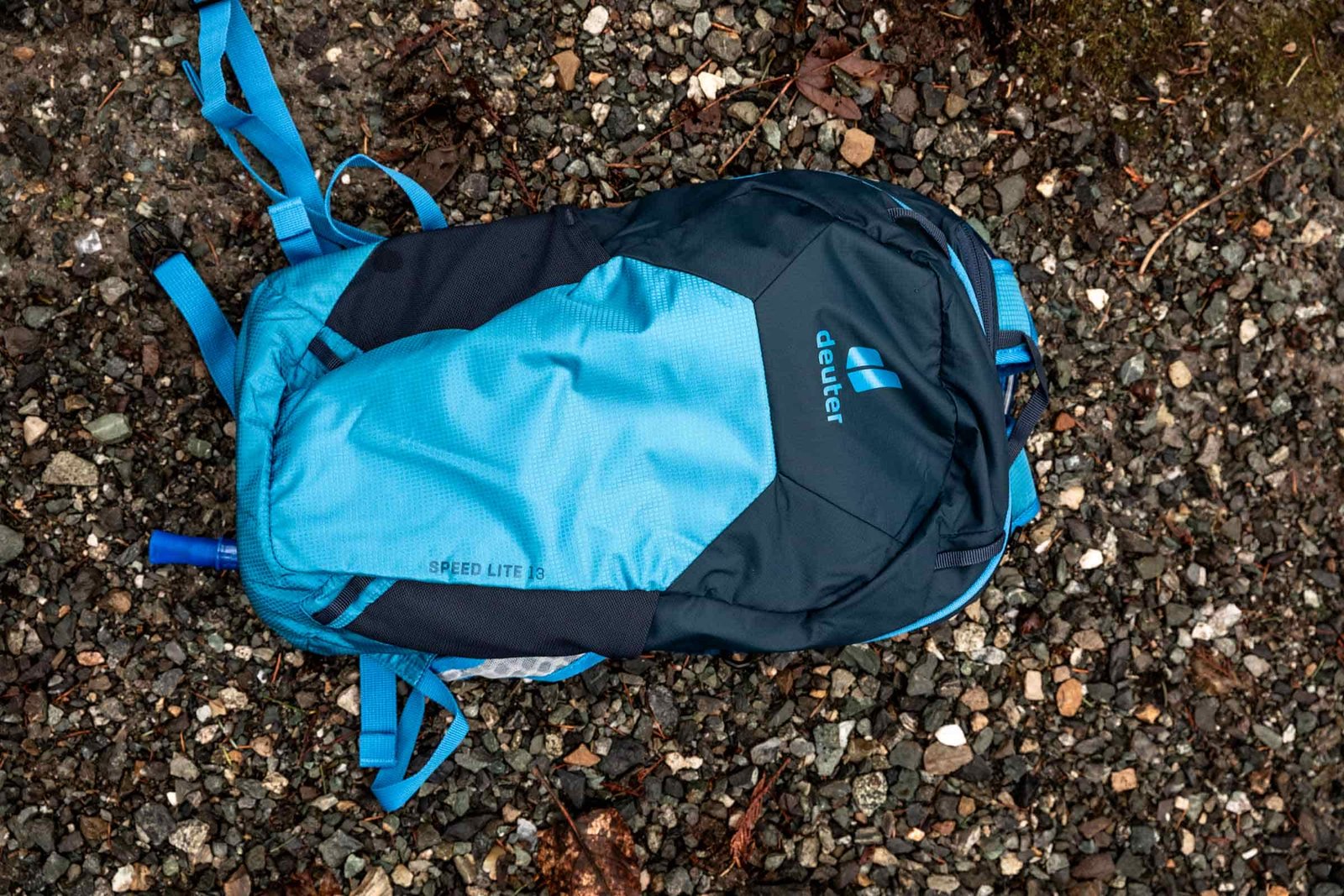 Details of Deuter Speed Lite 13 Hydration Pack - overall view of the pack front laying on the ground