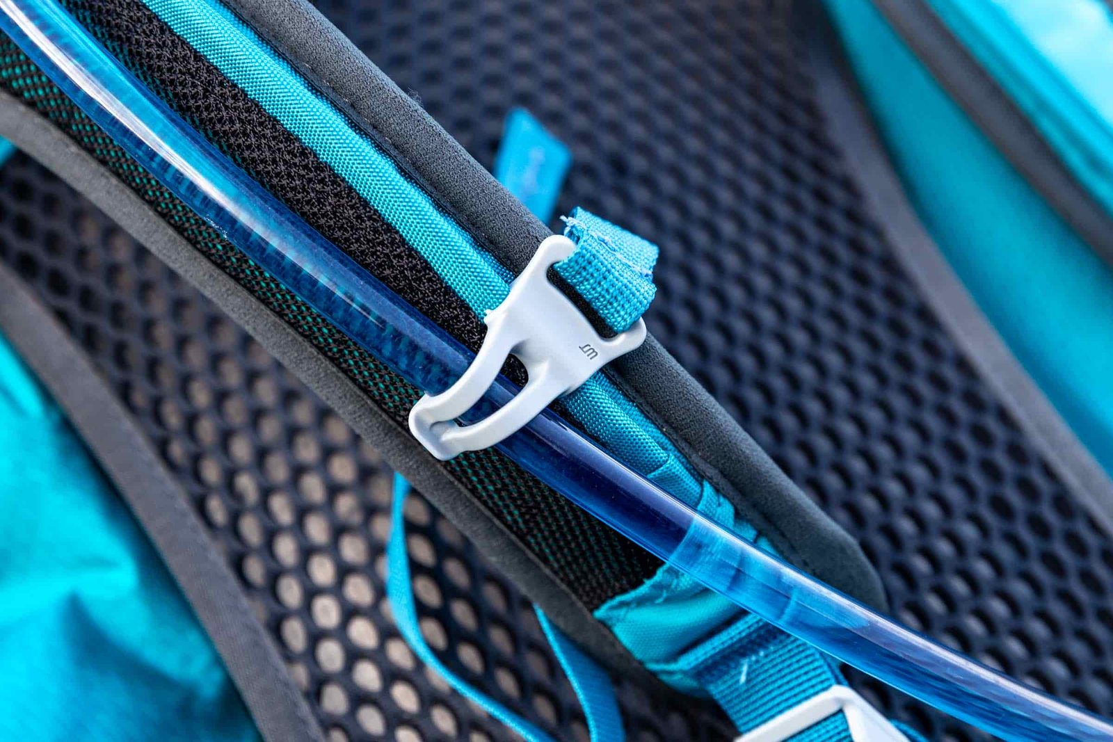 Details of Gregory Juno 24 H2O - a view of the hydration hose connection to the shoulder strap