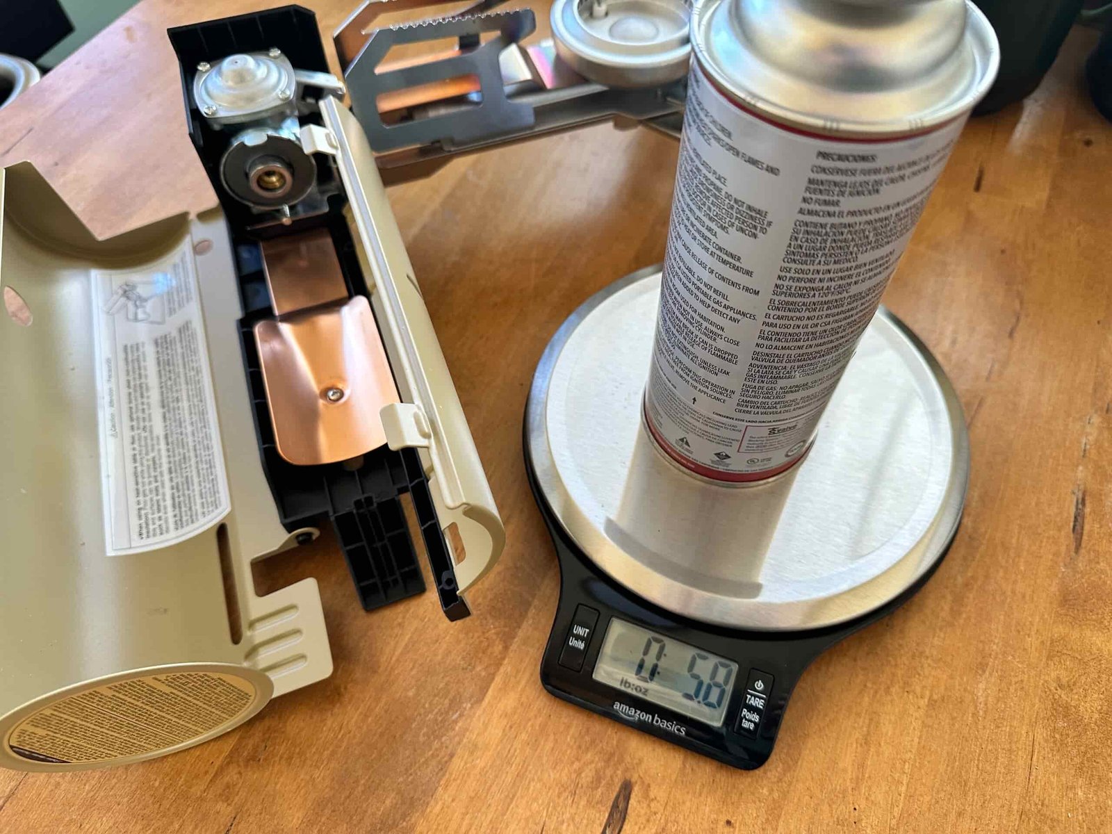 A close up of a scale weighing fuel for a stove to show efficiency