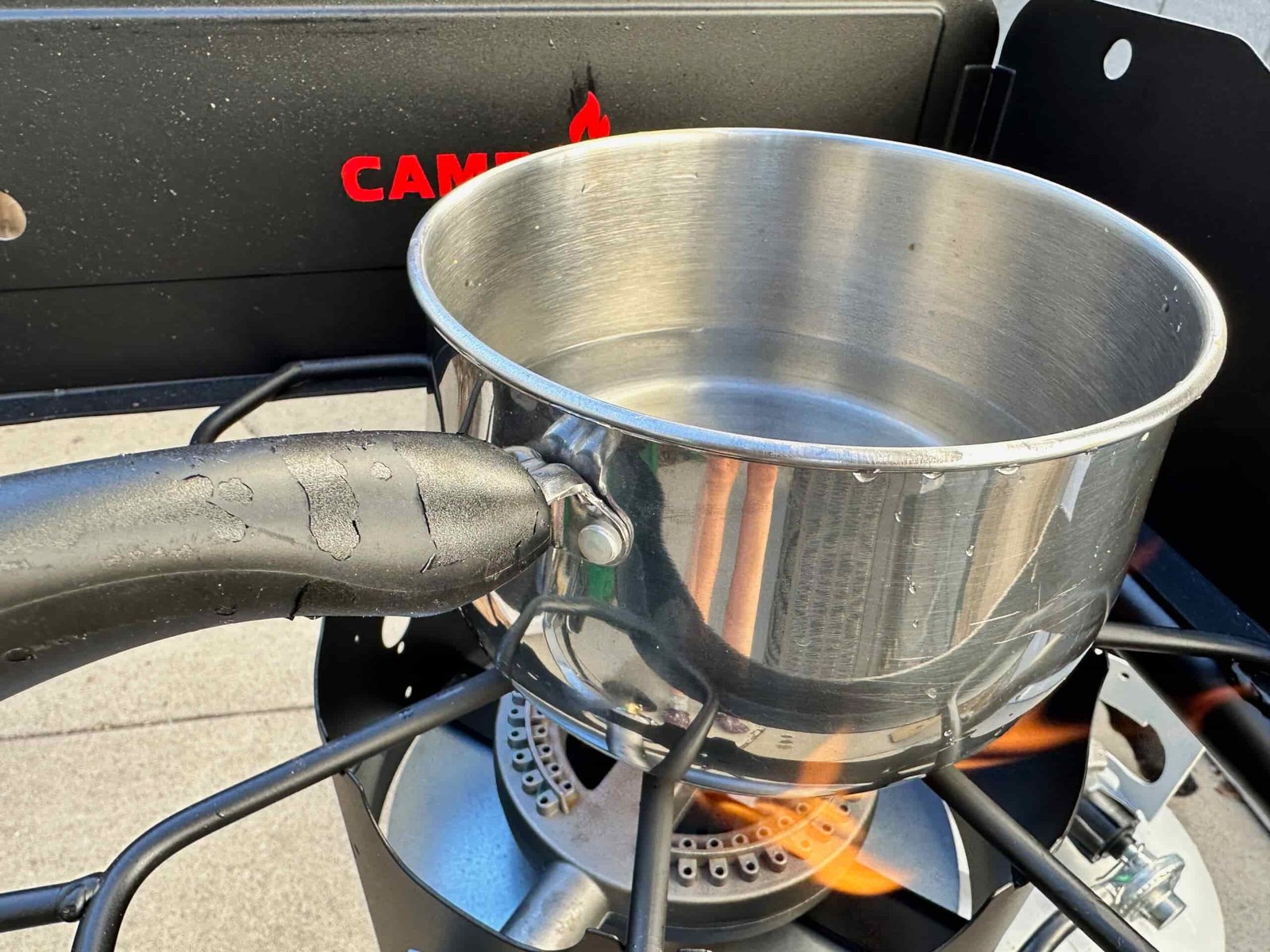 close up of a pot of water boiling on the Camp Chef EX60LW Explorer 2 Burner Outdoor Camping Modular Cooking Stove