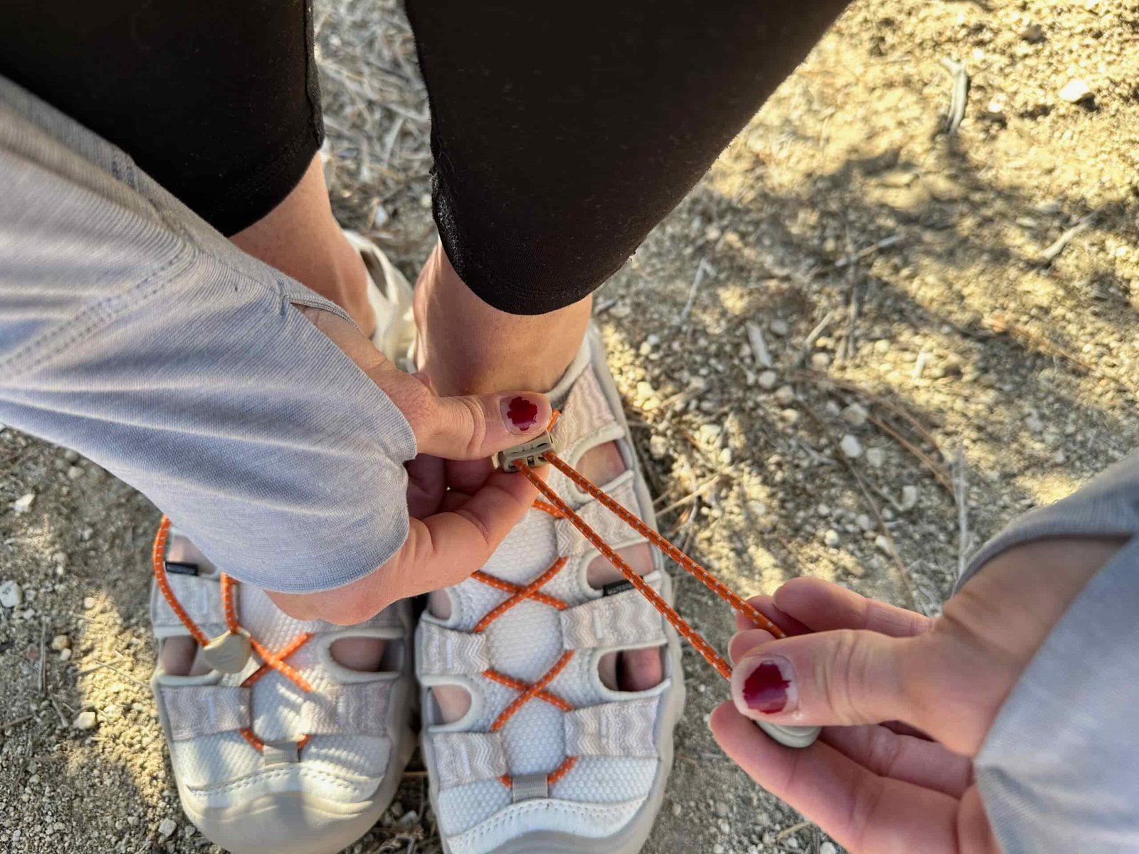 A woman showing how the Keen Hyperport H2 Sandal fits