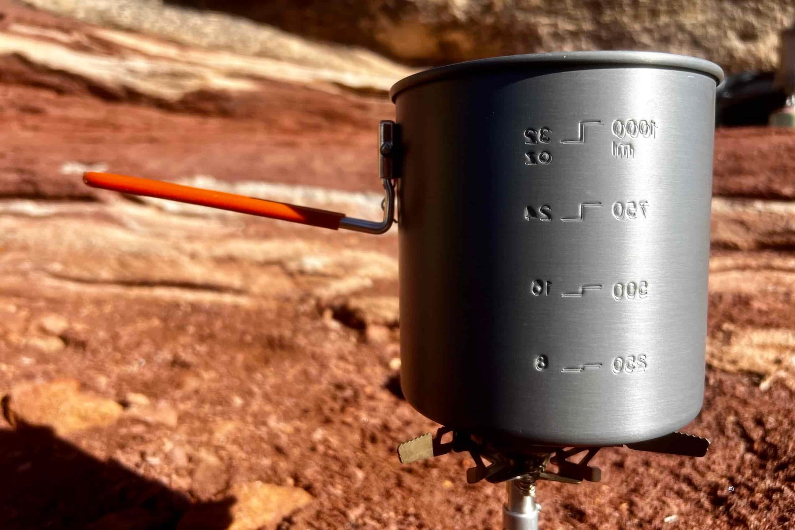 A close up of the gsi halulite boiler and its measurement markings against a red rocks background.