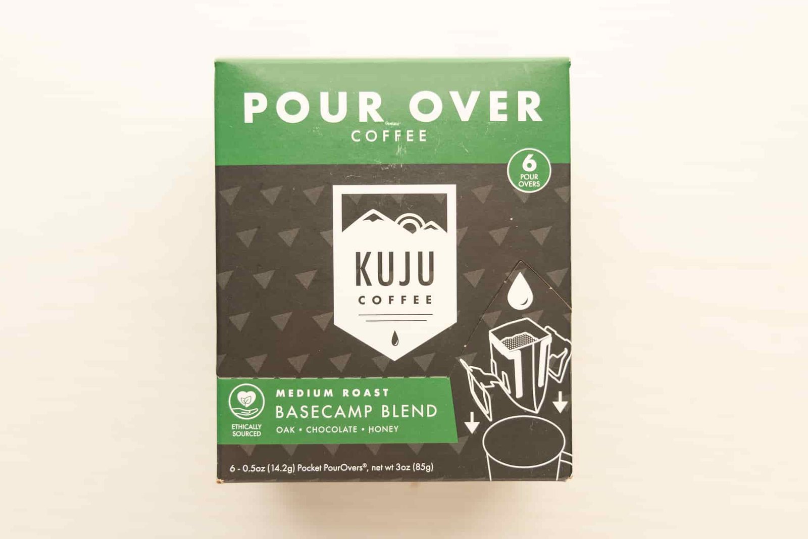 A box of Kuju Single-Serve Pour-Over packets.