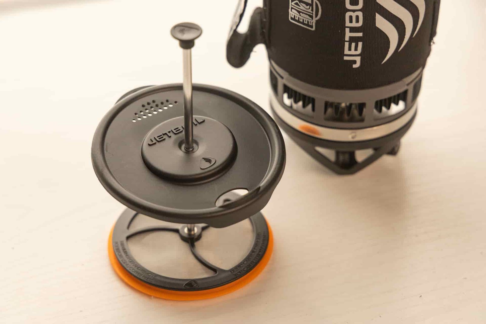 The Jetboil Silicone Coffee Press lid, filter, and plunger.