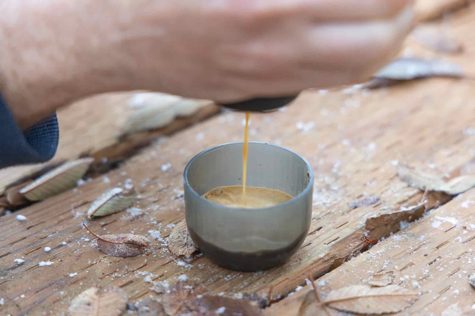 Extracting a shot of espresso with the Wacaco Minipresso.