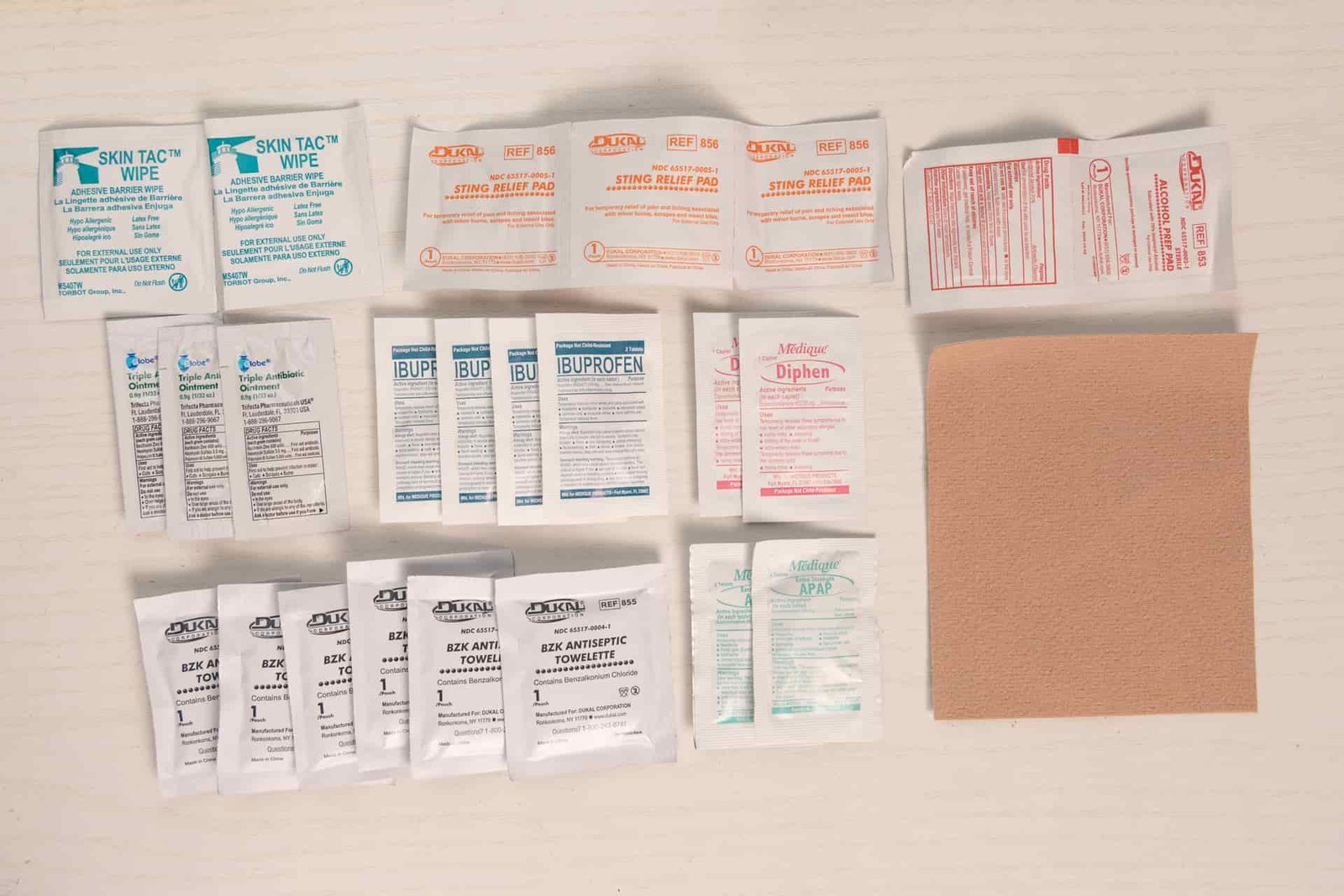 Some of the first aid supplies in the Adventure Medical Kits Ultralight.