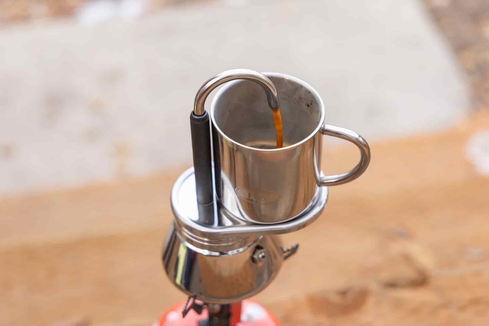 Coffee pouring out of the GSI Mini Espresso.