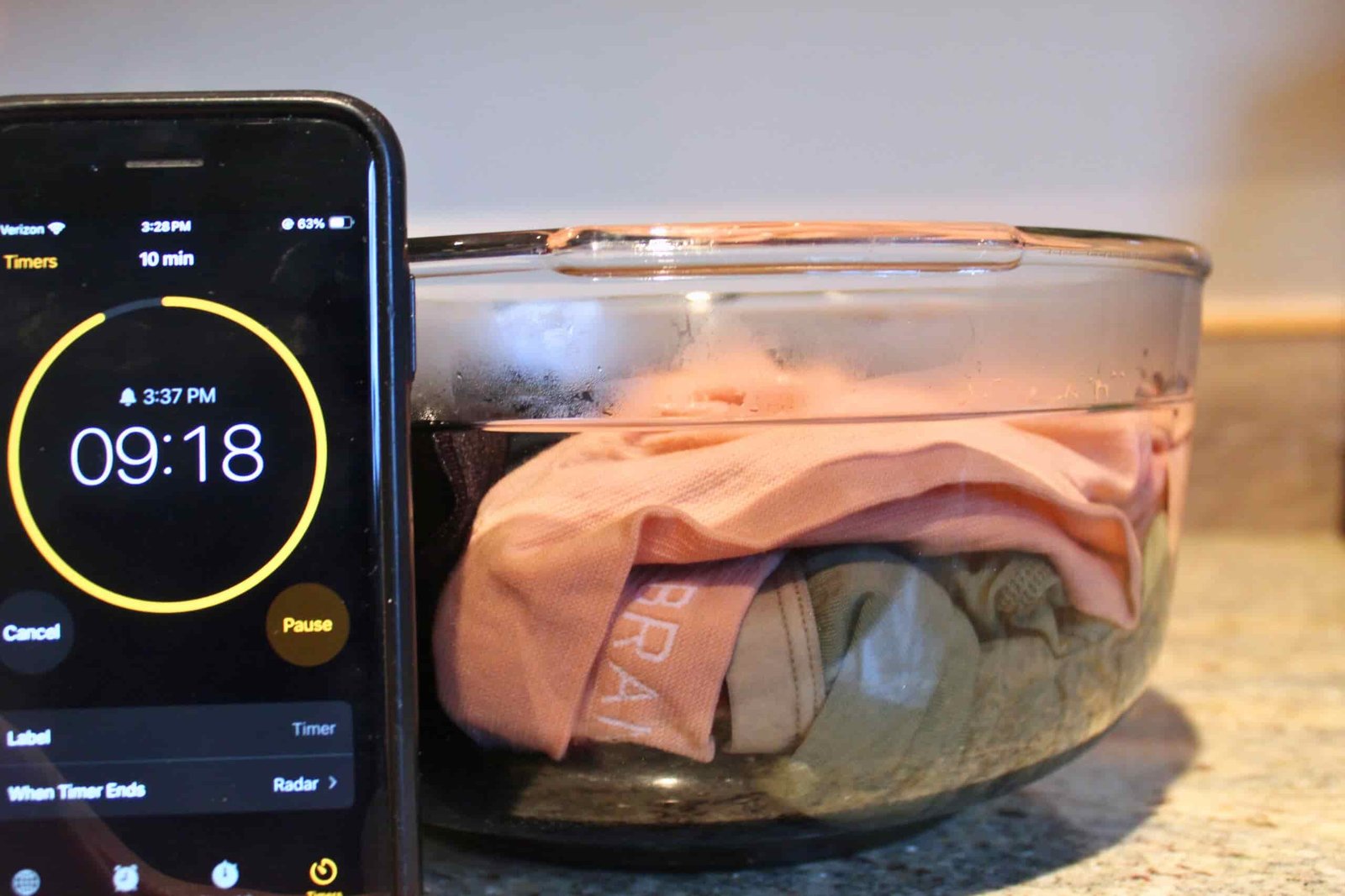 Soaking the underwear in a bowl before a drying test