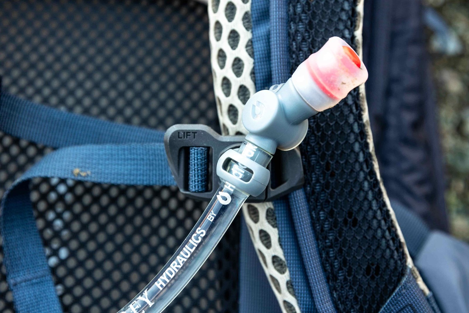Details of Osprey Mira 22 - attaching the hydration hose to the shoulder strap