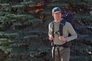 a man wearing a black backpack