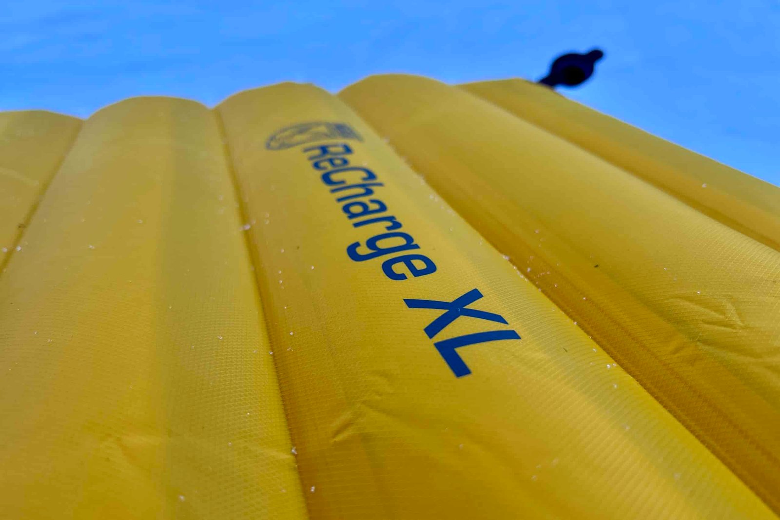 Close-up image of the wide, thick baffles of a camping sleeping pad.