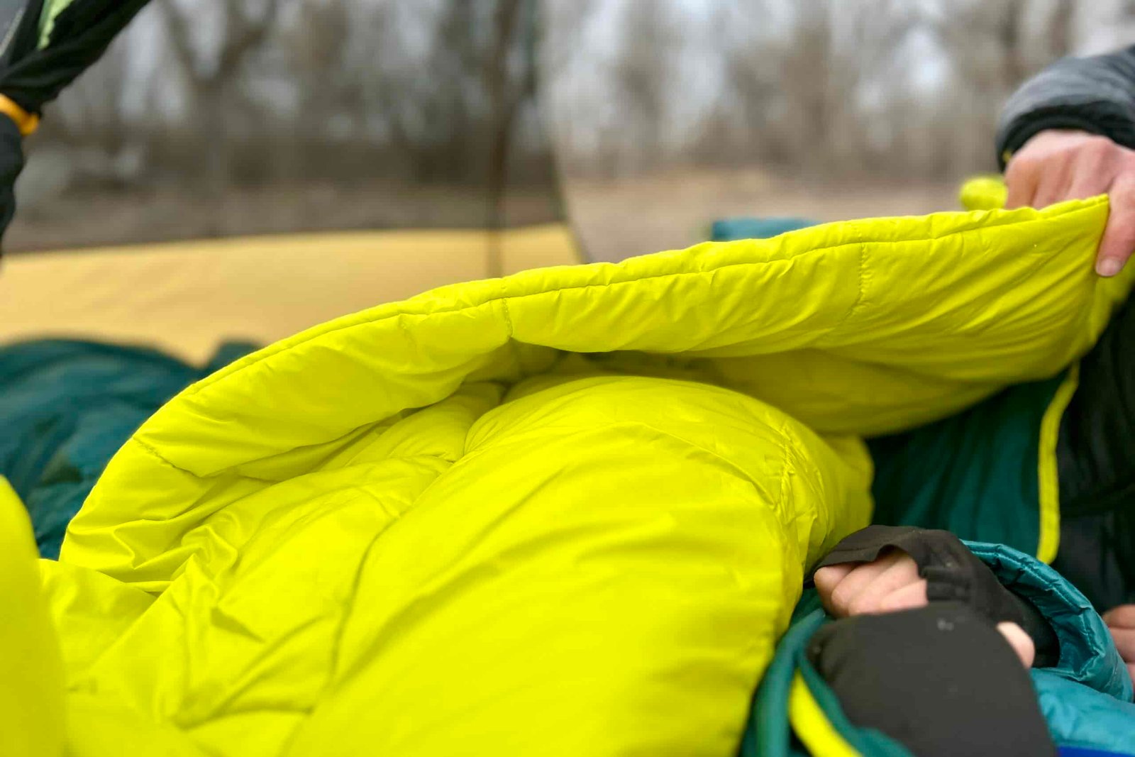 Close up image of the thick synthetic material of a sleeping bag.