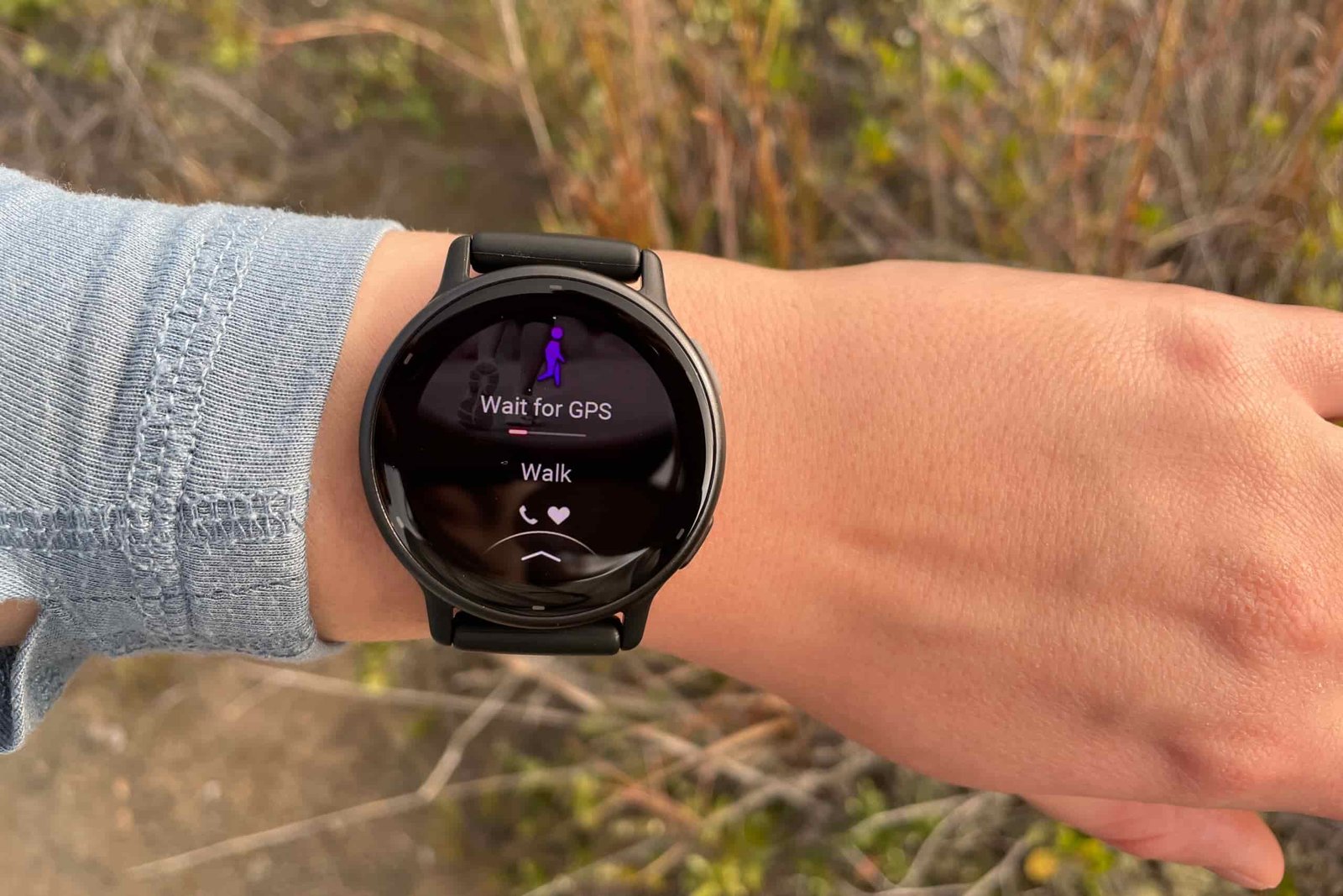 A closeup of a GPS watch as it acquires satellite connection.