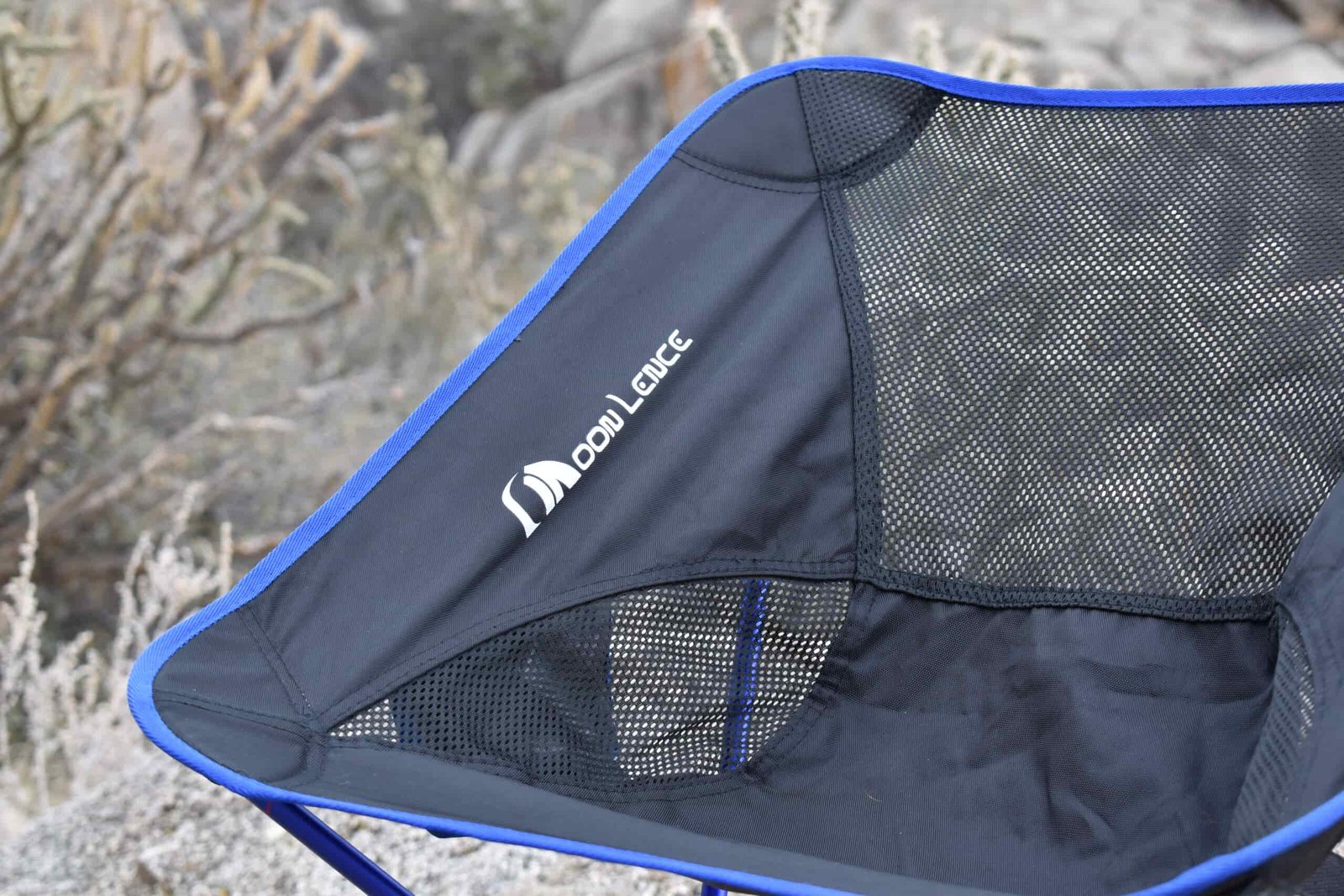 close up of the aerating mesh on the seat fabric of the Moon Lence chair
