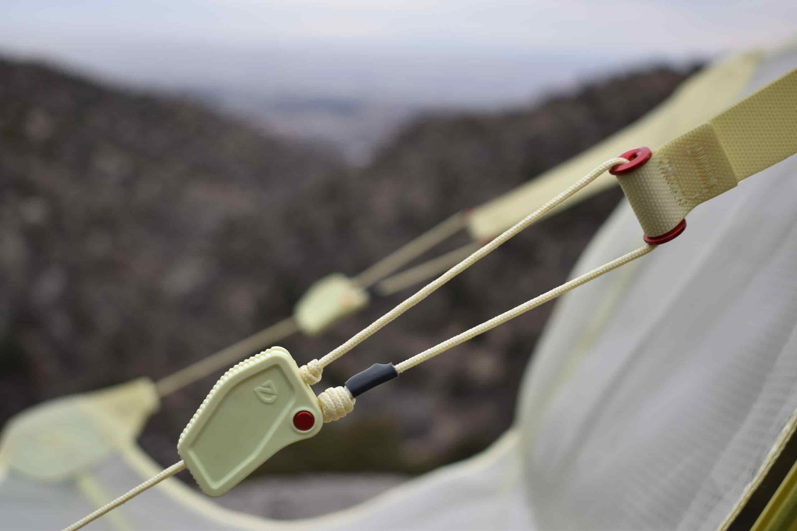 close up of the adjustable tabs on the arms of the chair, which allow you to adjust your sitting position