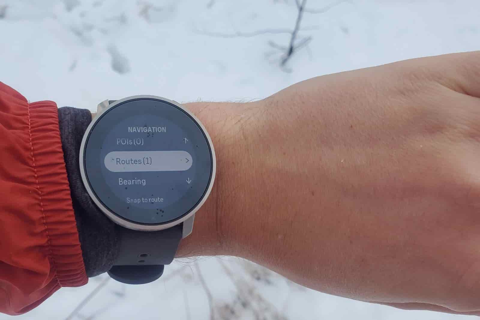 A closeup of a watch screen showing routes.