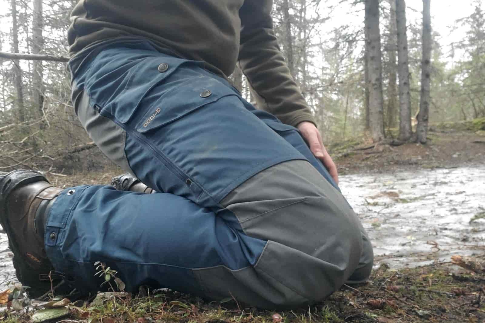 A closeup of the knees of a pair of work pants.