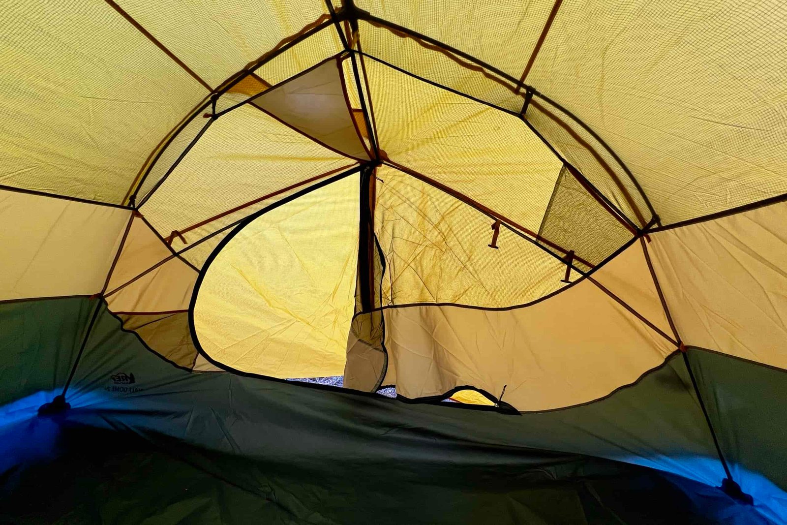 the inside of a yellow tent