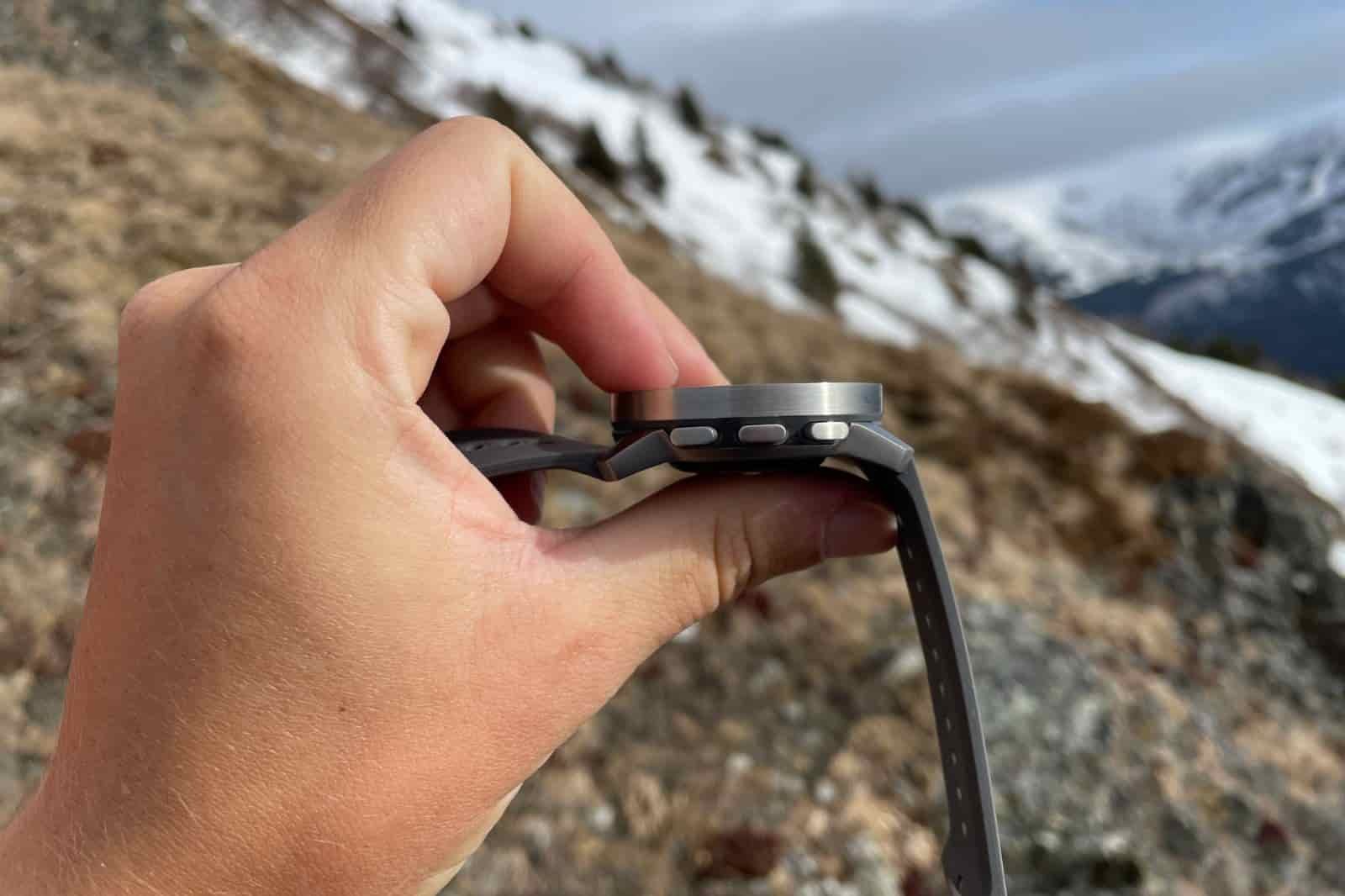 A closeup of the buttons of a GPS watch.